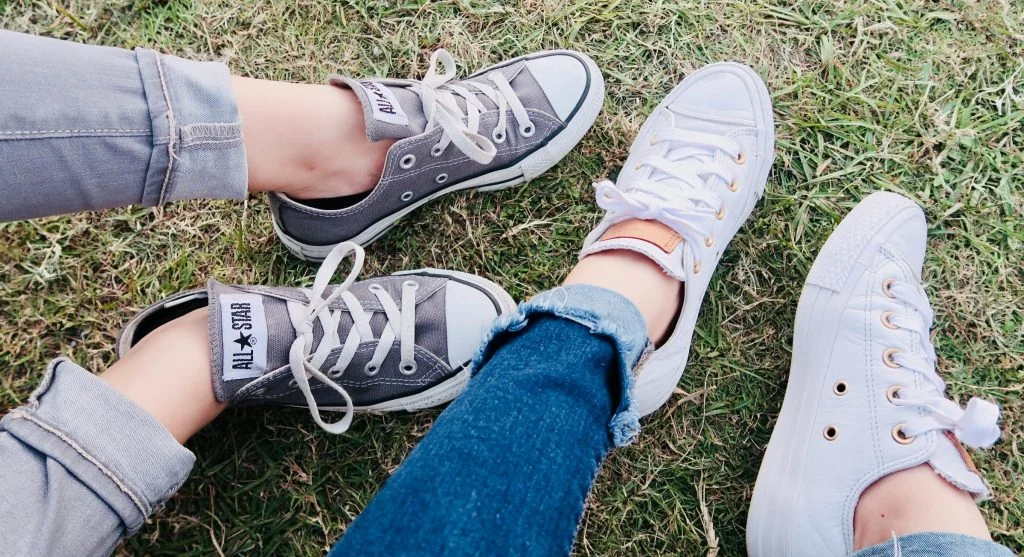 Woman wearing fashionable outfit with simple supportive shoes
