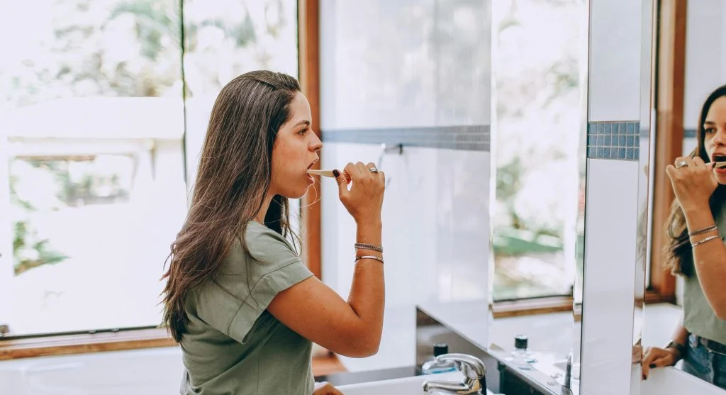A person practicing a healthy habit at home