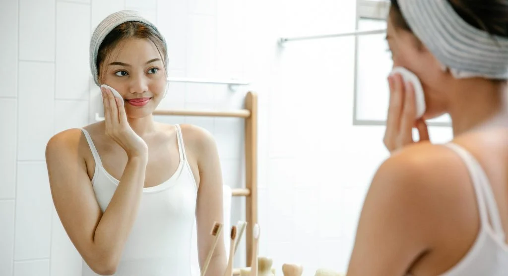 Woman following a consistent daily beauty and grooming routine