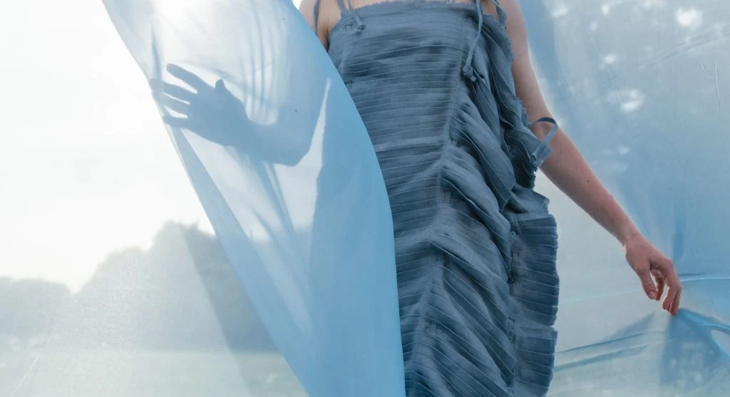 lightweight warm-weather fabrics shown in motion through a dress and airy skirt
