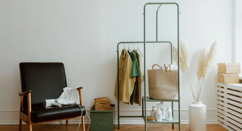 One-basket daily catch system used in a shared living room to manage everyday clutter