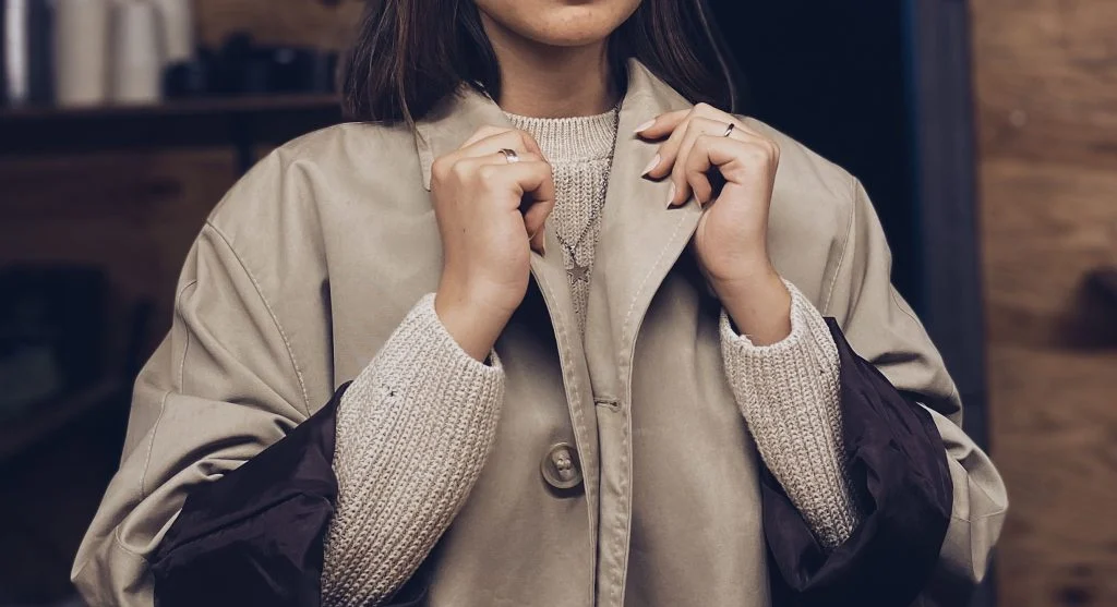 Outfit weight balanced by mixing heavier clothing pieces with lighter accessories and fabrics