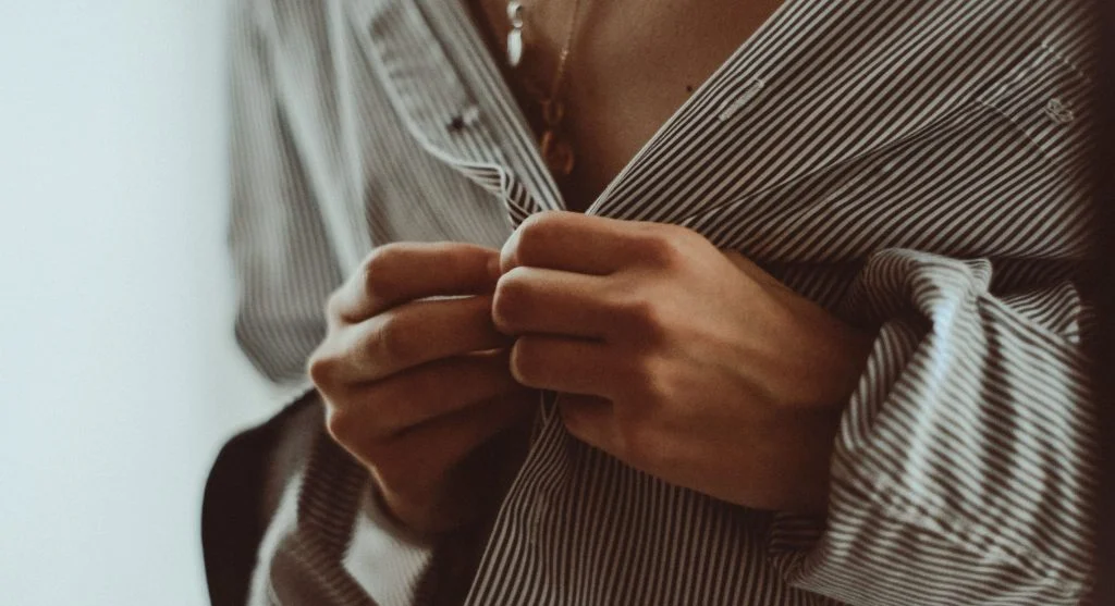 Small styling move of simplifying one area to make the whole outfit look more thoughtful