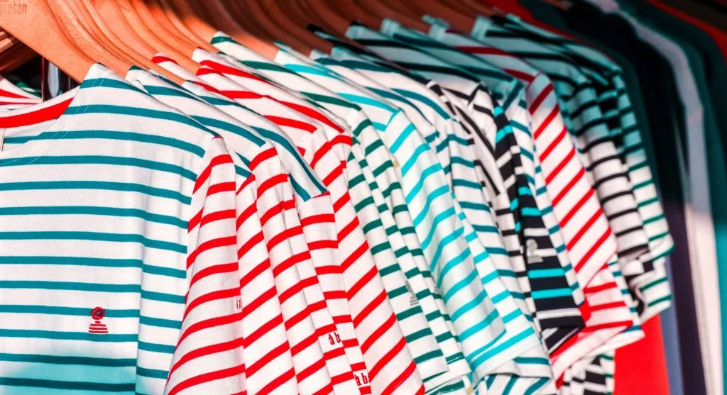 Fabric weight comparison between a heavier summer shirt and a lighter breathable one