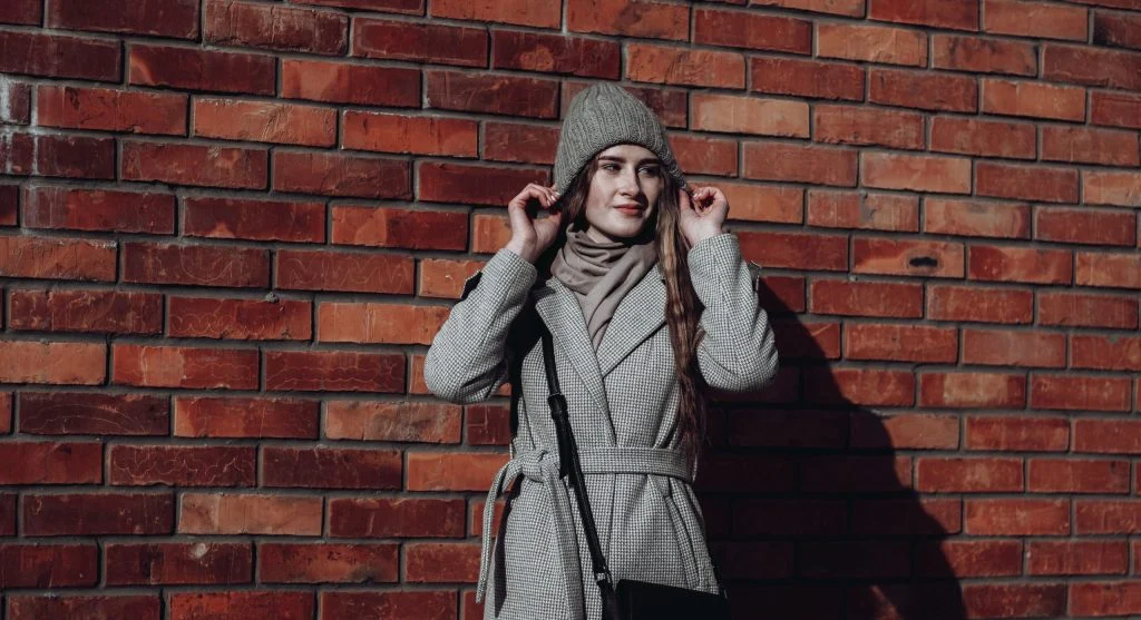 Weather-ready layer making a simple seasonal outfit easier to adjust through the day