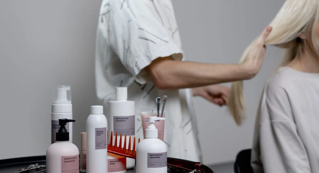 Reliable hair routine using a few core grooming products in a simple bathroom setup