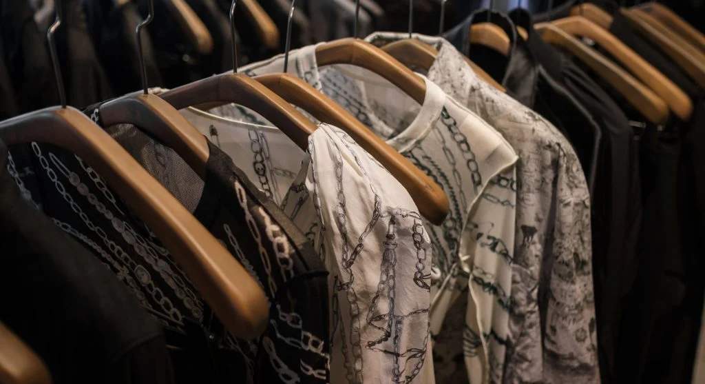 Repeated trouser shape acting as a strong outfit anchor across multiple daily looks