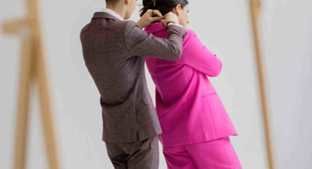 Softer outfit symmetry compared with a more formal and rigid symmetrical outfit