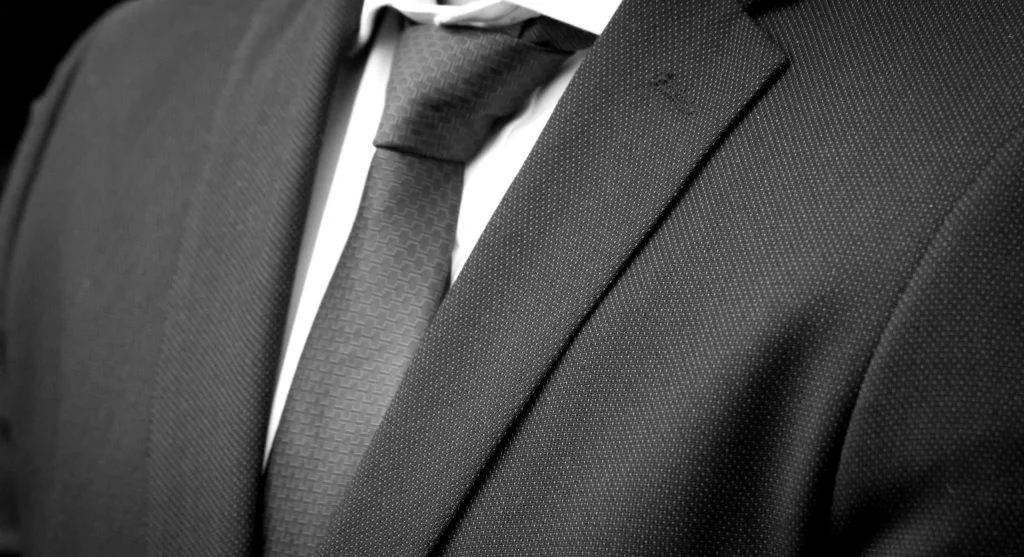 Softer vertical lines compared with a sharper more structured outfit approach
