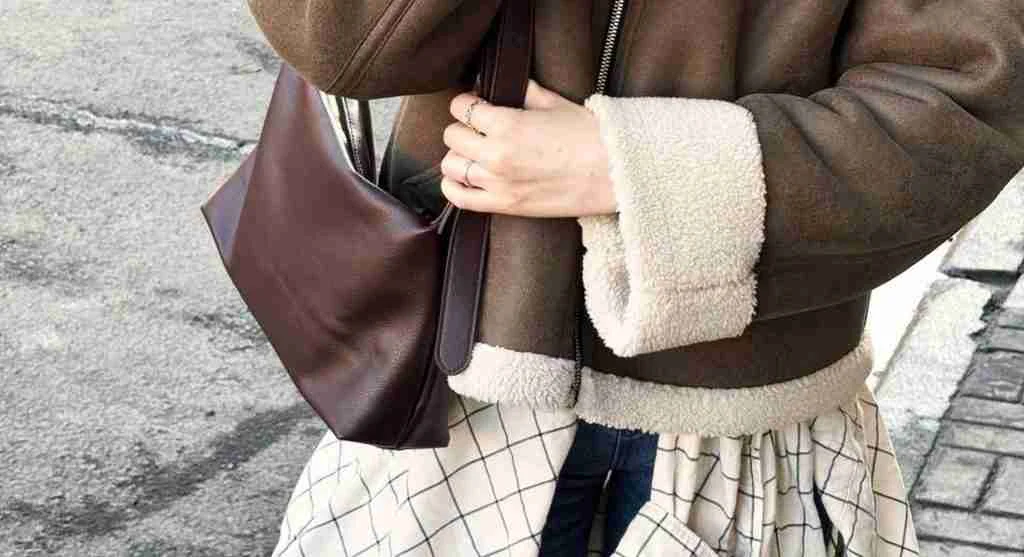 Small layer-ready section arranged to support quick everyday outfit finishing