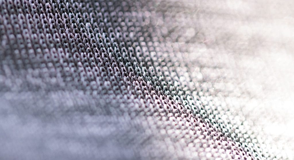 Softly defined outfit edges compared with sharper and more rigid finishing lines